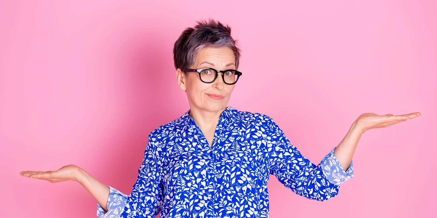 Frau mit fragender Geste